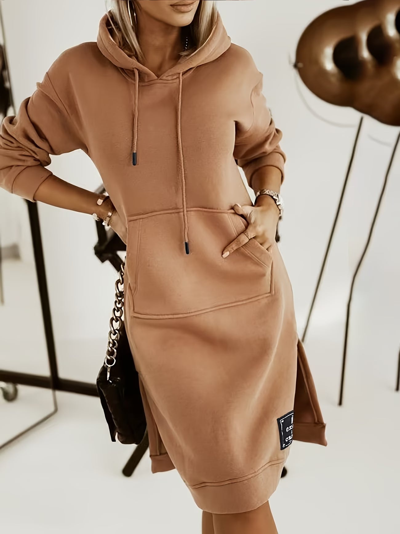 Vestito da donna con cappuccio